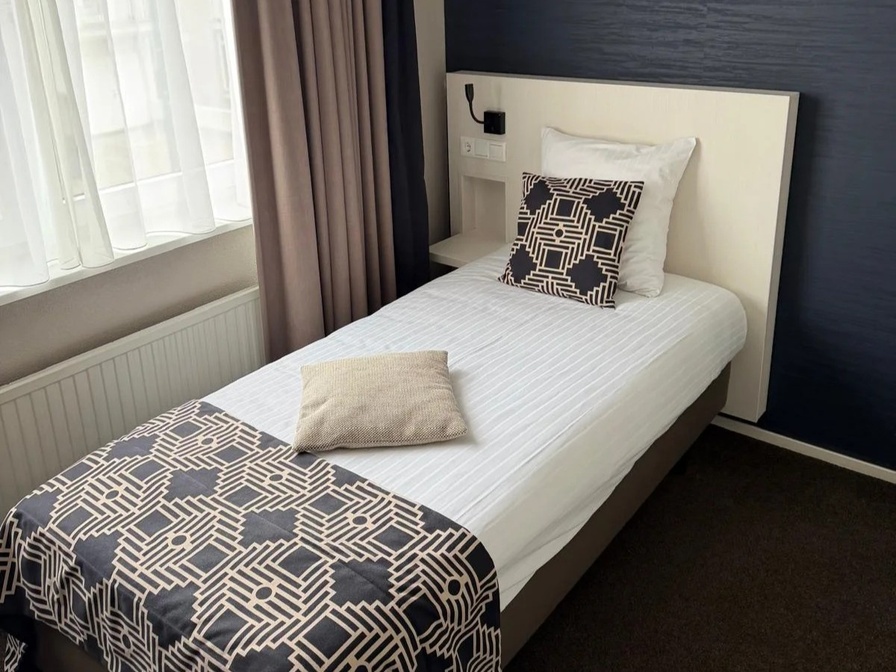 Eenpersoons ruime kamer - Douche/toilet